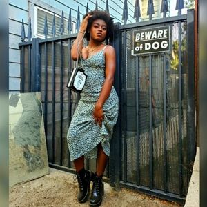 Claim the Kingdom Midi Dress from DollsKill!